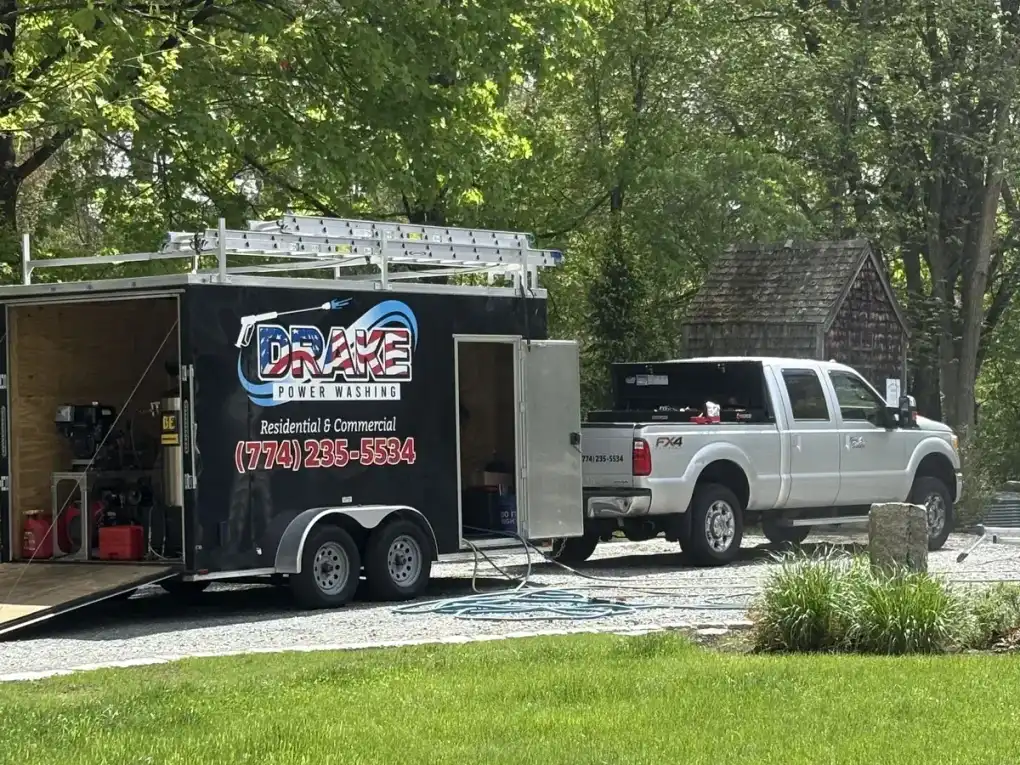 Drake Power Washing enclosed service trailer open and set up at a residential job site