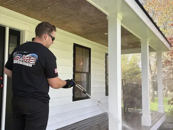 Drake Power Washing pressure washing house porch and front entry at Campbells Station