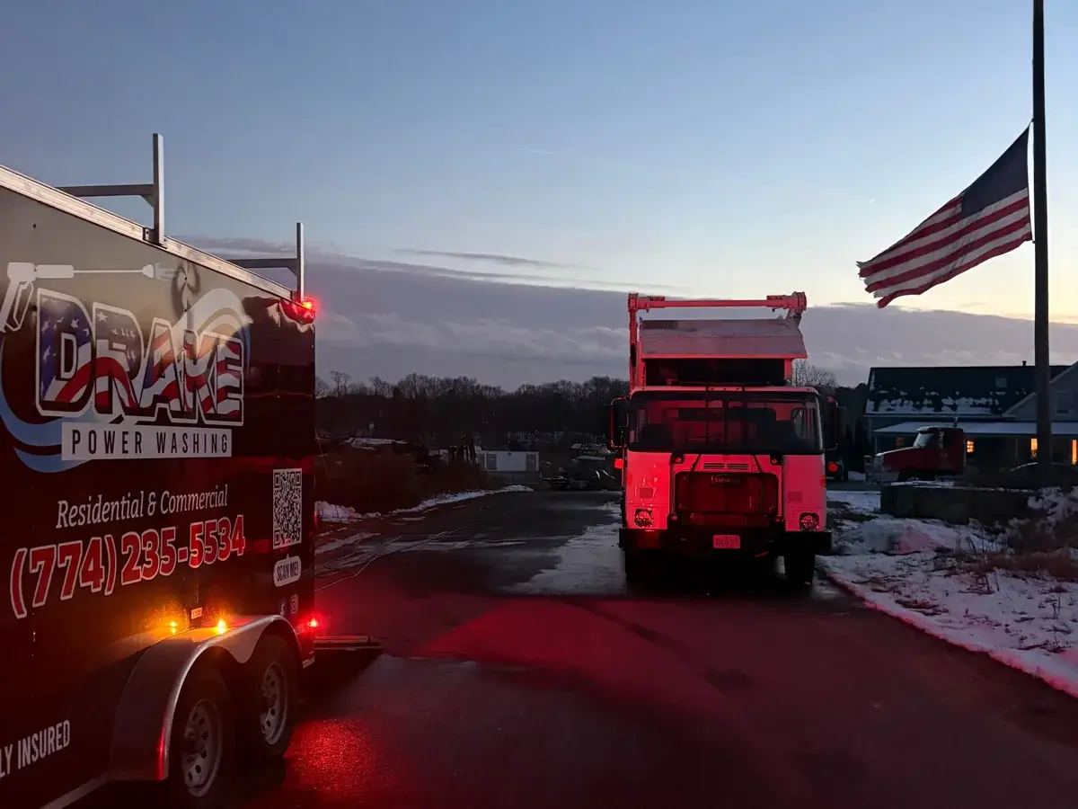 Drake Power Washing service truck and trailer with American flag - professional equipment for exterior cleaning services