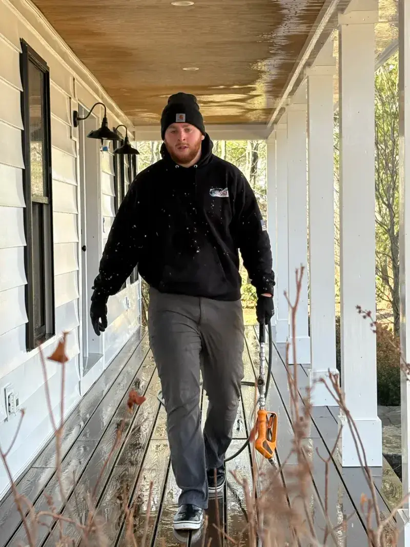 Shane Drake inspecting deck cleaning project