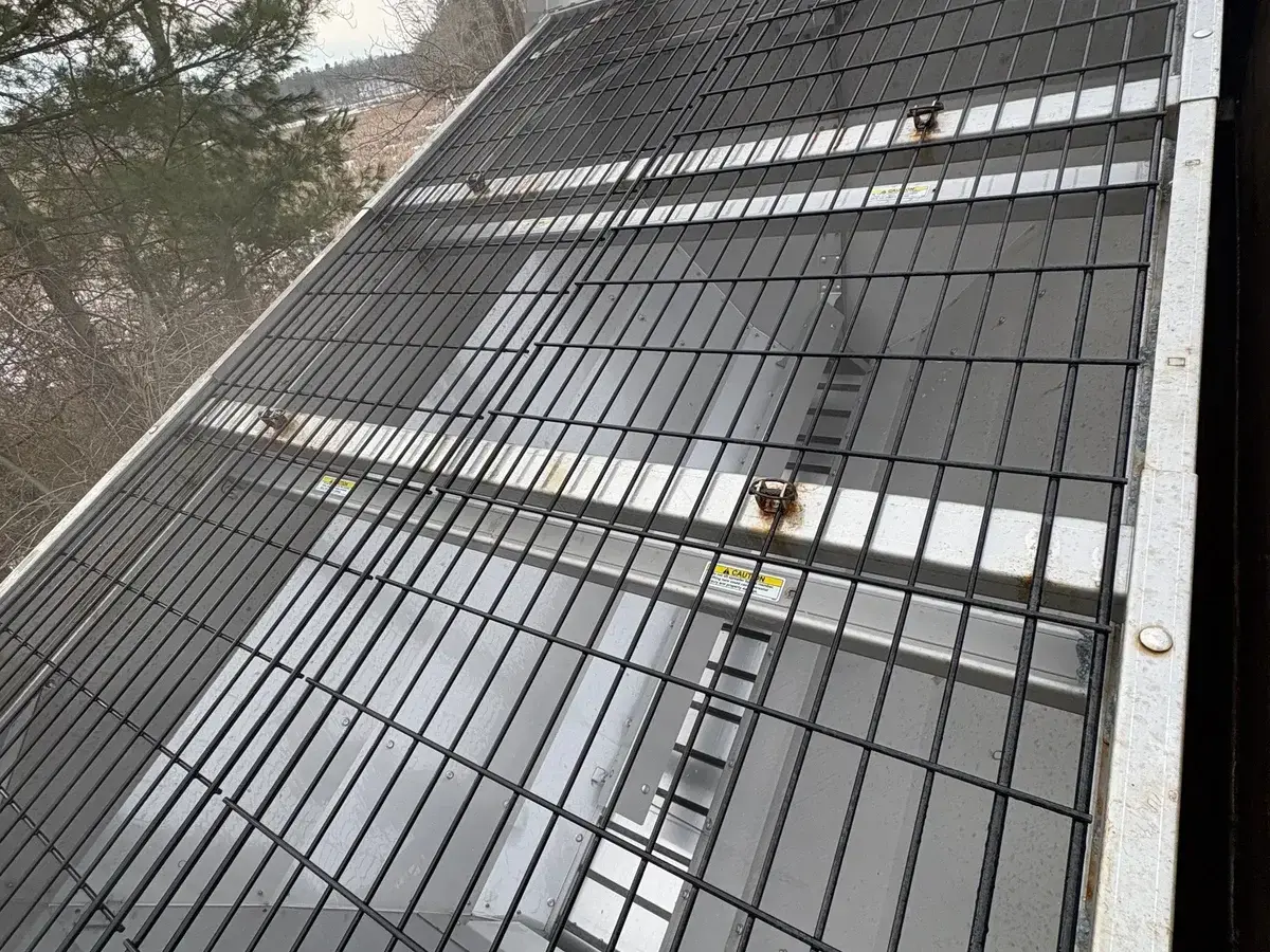 Industrial metal grating after Drake Power Washing - clean and restored