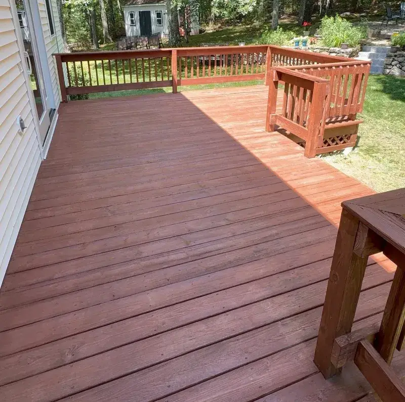 Restored deck and fence after cleaning