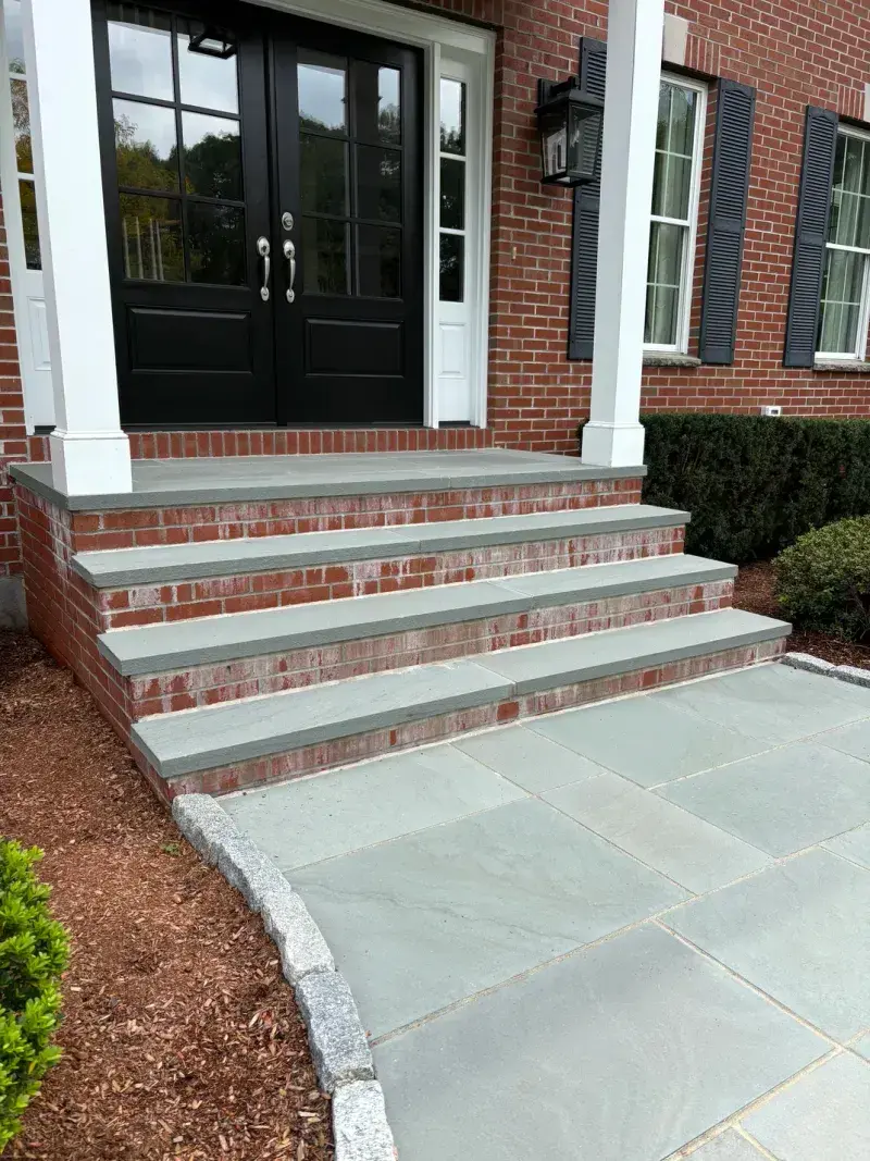 Brick surface with efflorescence mineral deposits
