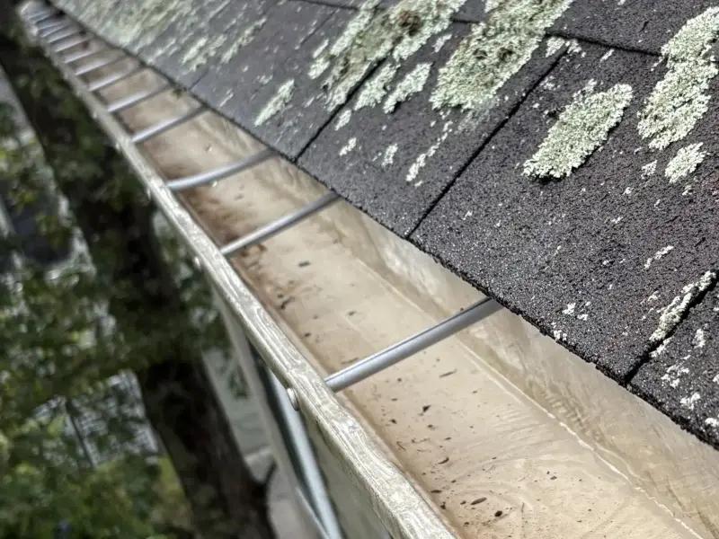 Spotless gutter after Drake Power Washing service