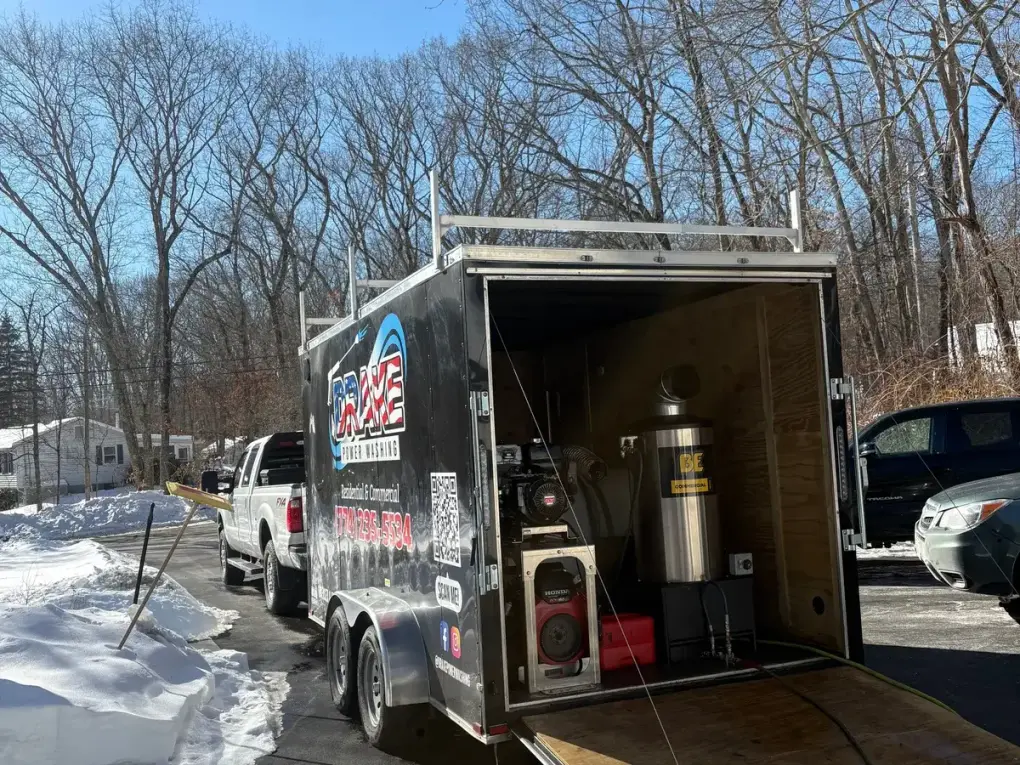 Drake Power Washing branded trailer with professional steam ice dam removal equipment