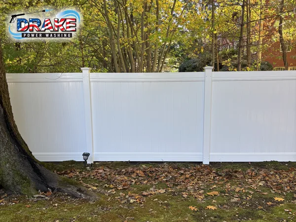 White vinyl fence after professional fence cleaning in Franklin MA