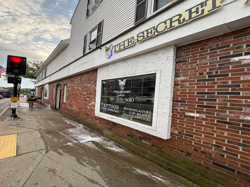 Storefront before cleaning - dirty sidewalk and entrance